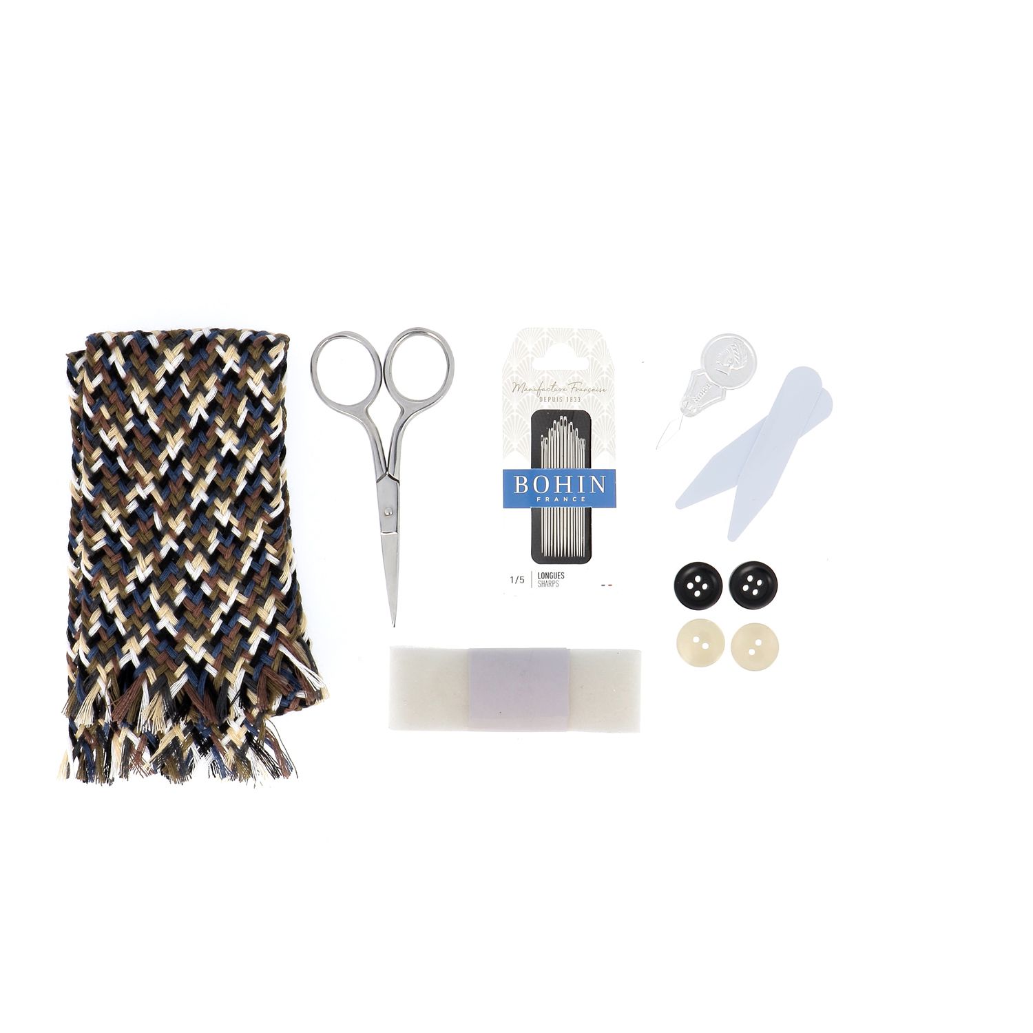 Sewing accessories included in the sewing kit for men